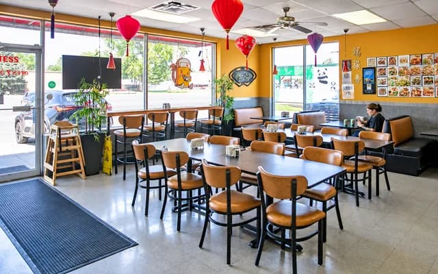 Booths and tables by the front windows
