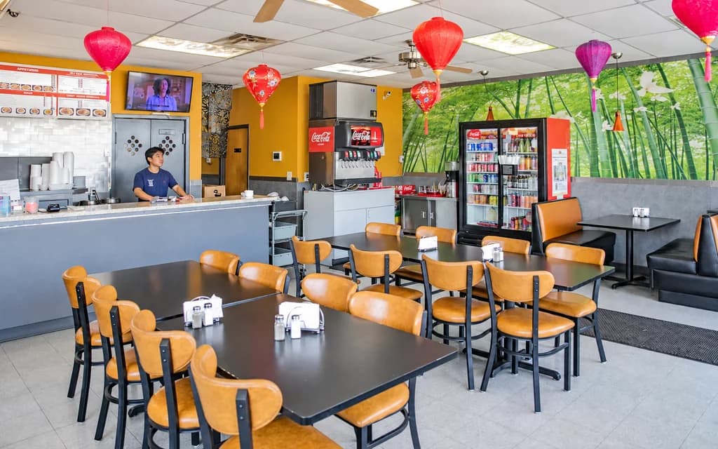 Staff at the counter of Tsing Tsao Chinese Fast Food
