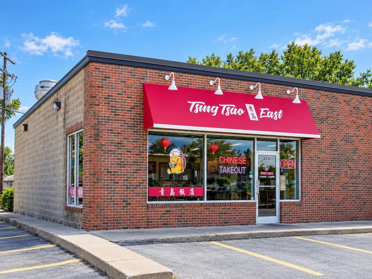 Tsing Tsao East storefront: the red awning and brick building at 2231 East University Avenue, Des Moines